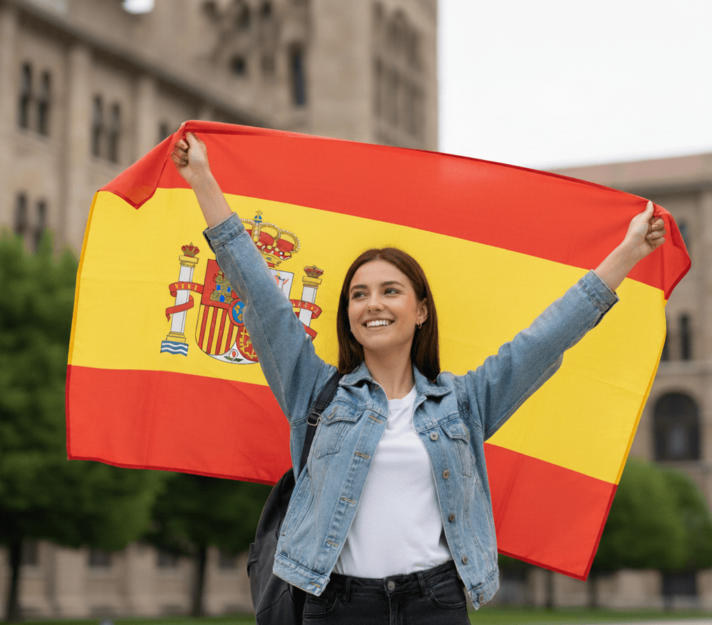 Girl holding the flag of Spain.