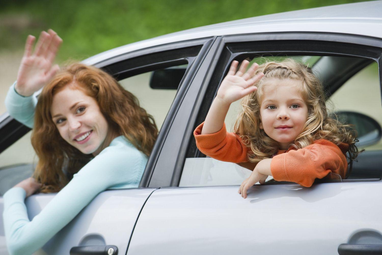 girls waving their goodbyes