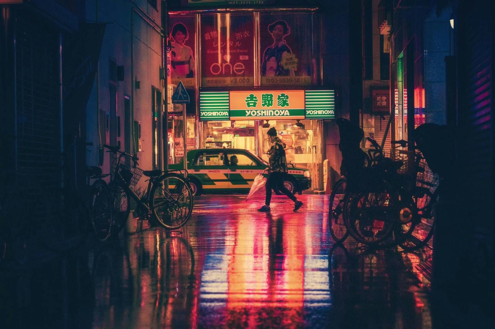 Someone walking through Japan on a rainy day—perhaps June, as per the stories behind the traditional Japanese months of the year