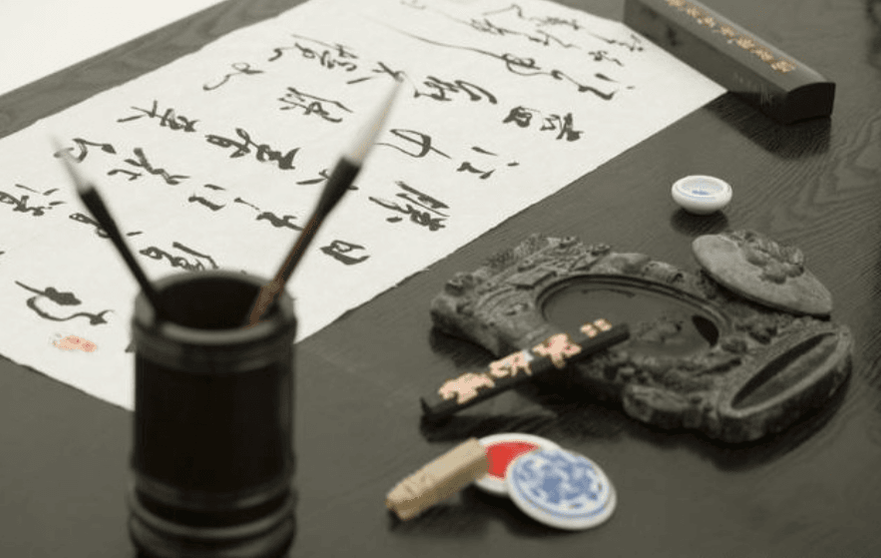 Calligraphy paper, ink, brush, plate