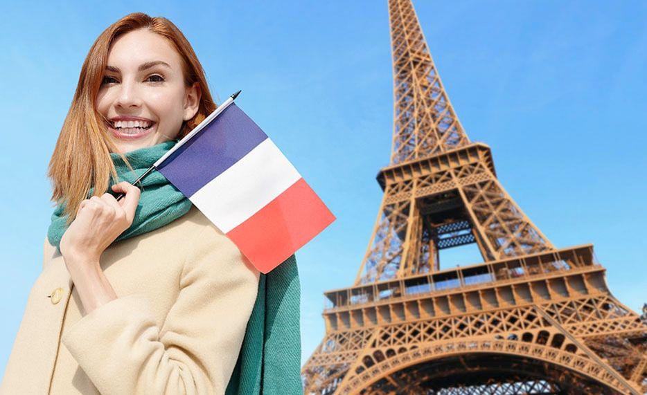 girl carrying flag of france